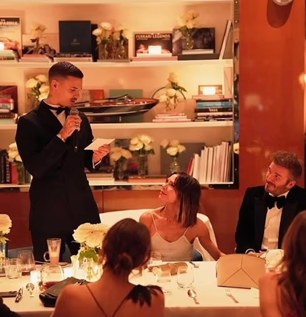 Romeo Beckham in a tuxedo, Victoria Beckham in a silver dress, David Beckham in a black tuxedo.