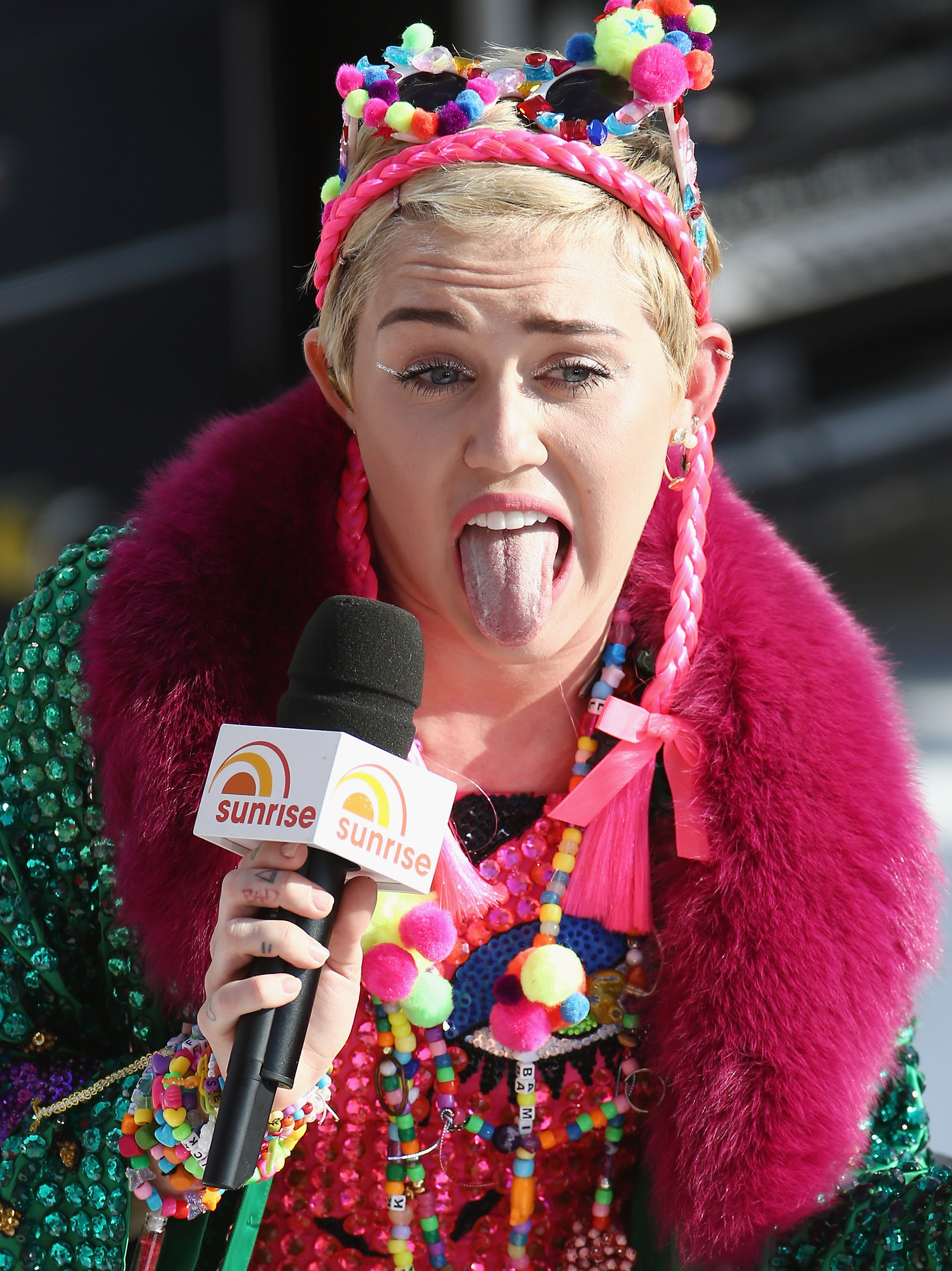 Miley Cyrus with her tongue out.