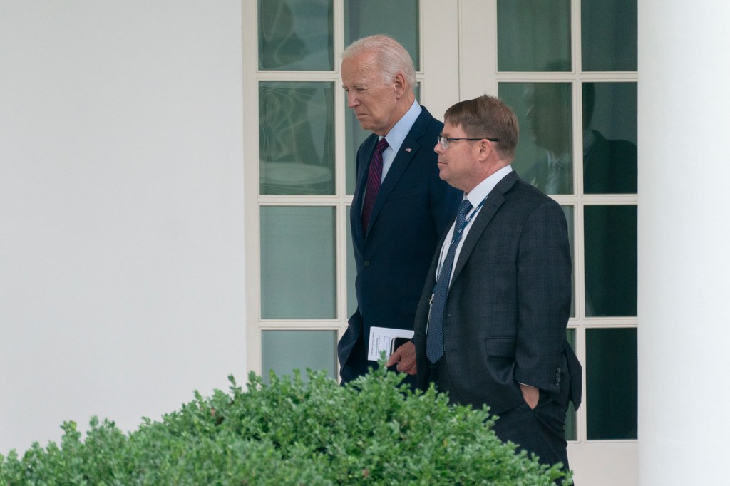 President Biden and his physician Kevin O'Connor walking at the White House.