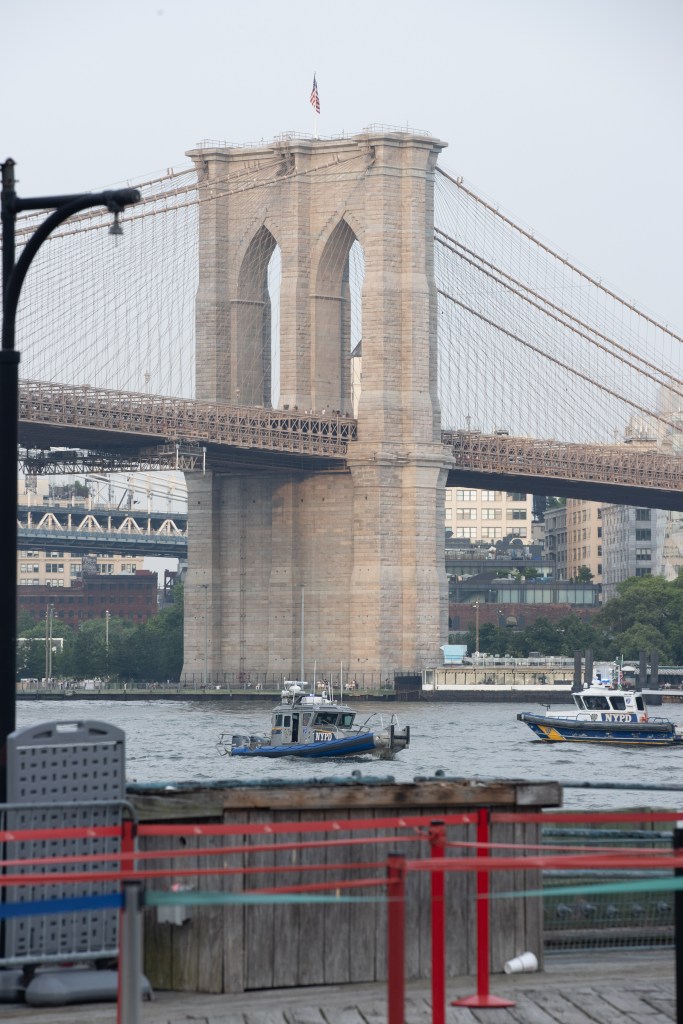 NYPD Harbor Unit boat near the Brooklyn Bridge. 
