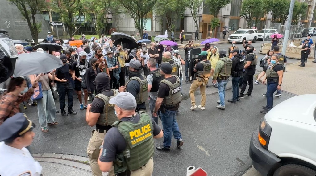 NYPD officers and immigrations officers clash with protestors after they blocked the roadway in front of 26 Federal Plaza in Lower Manhattan on Saturday, June 7, 2025