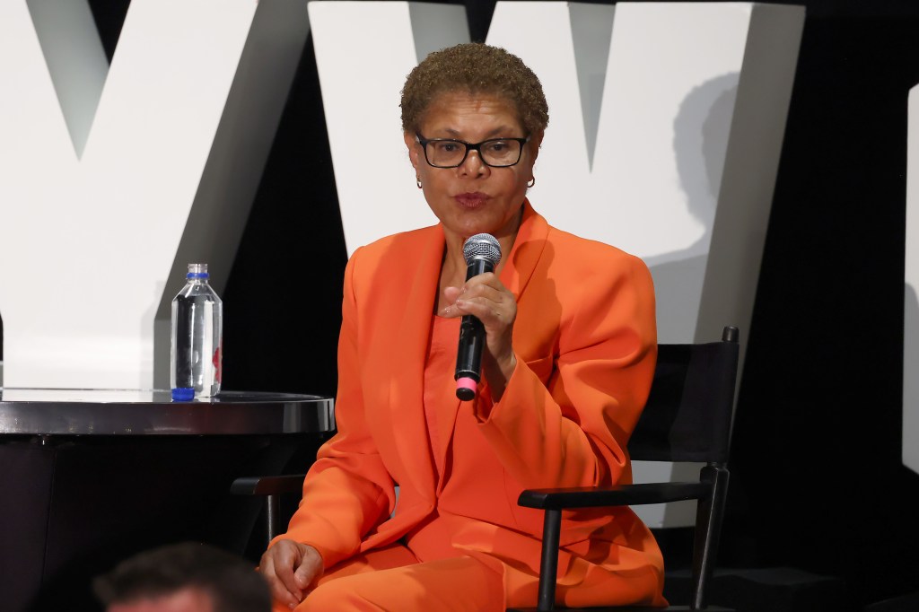 Mayor Karen Bass speaking at a luncheon.