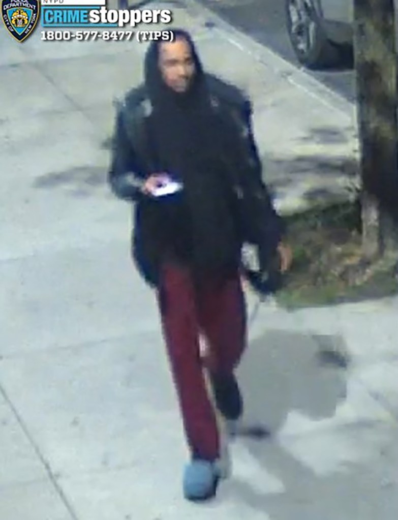 Surveillance image of a man wanted for questioning in connection with a forcible touching.