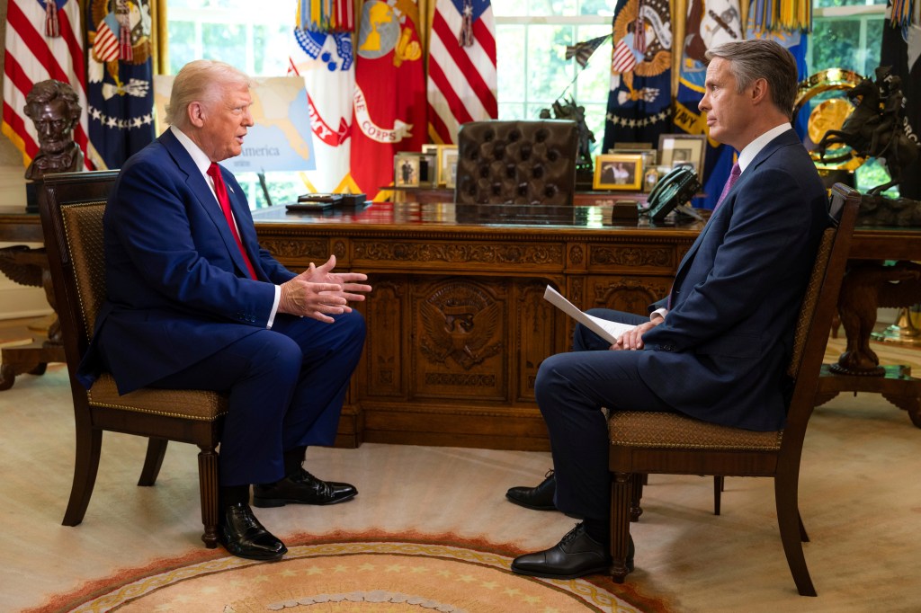 President Trump being interviewed in the Oval Office.