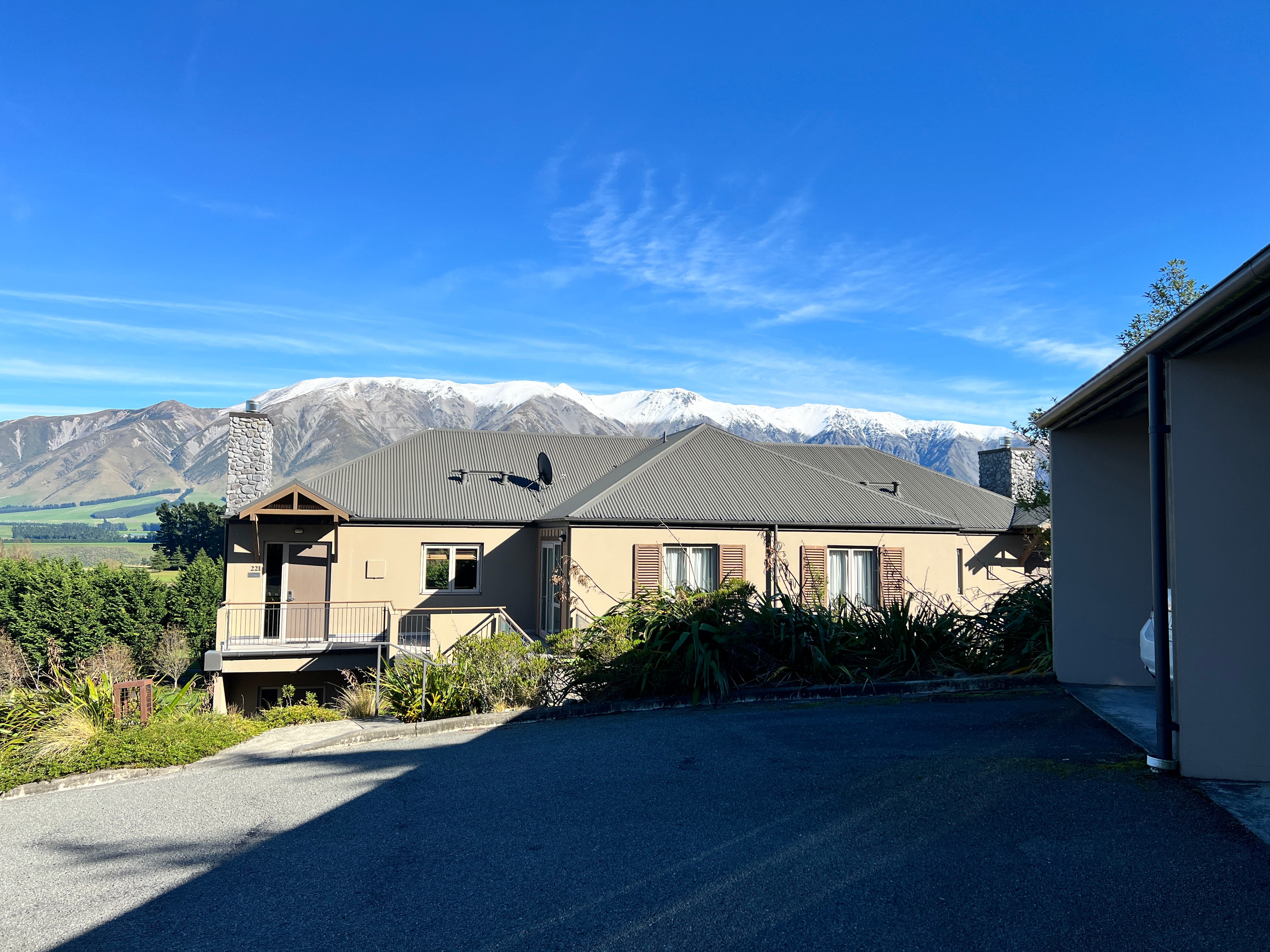 Villa in front of snow-capped mountains at Fable Terrace Downs Resort