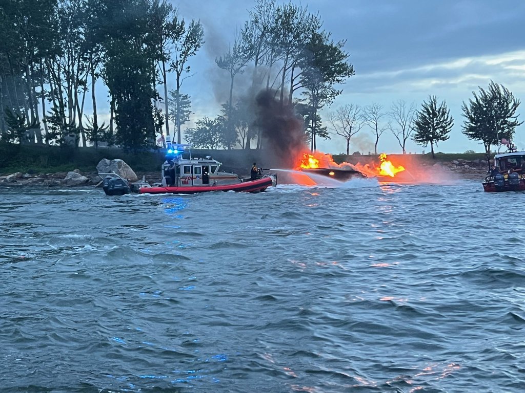 Boat fire near Hart Island with fireboats responding.