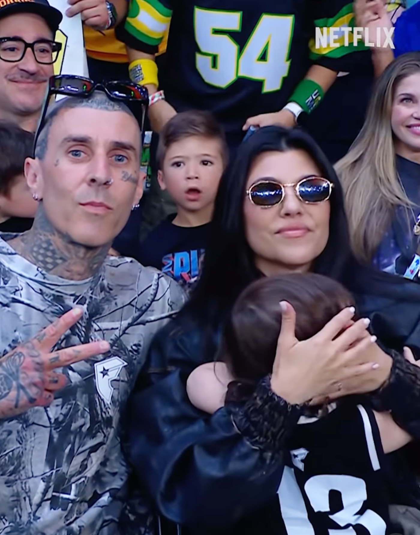 Kourtney Kardashian and Travis Barker made a rare public appearance with their son, Rocky, at the WWE’s Money in the Bank event in Los Angeles on Saturday.
