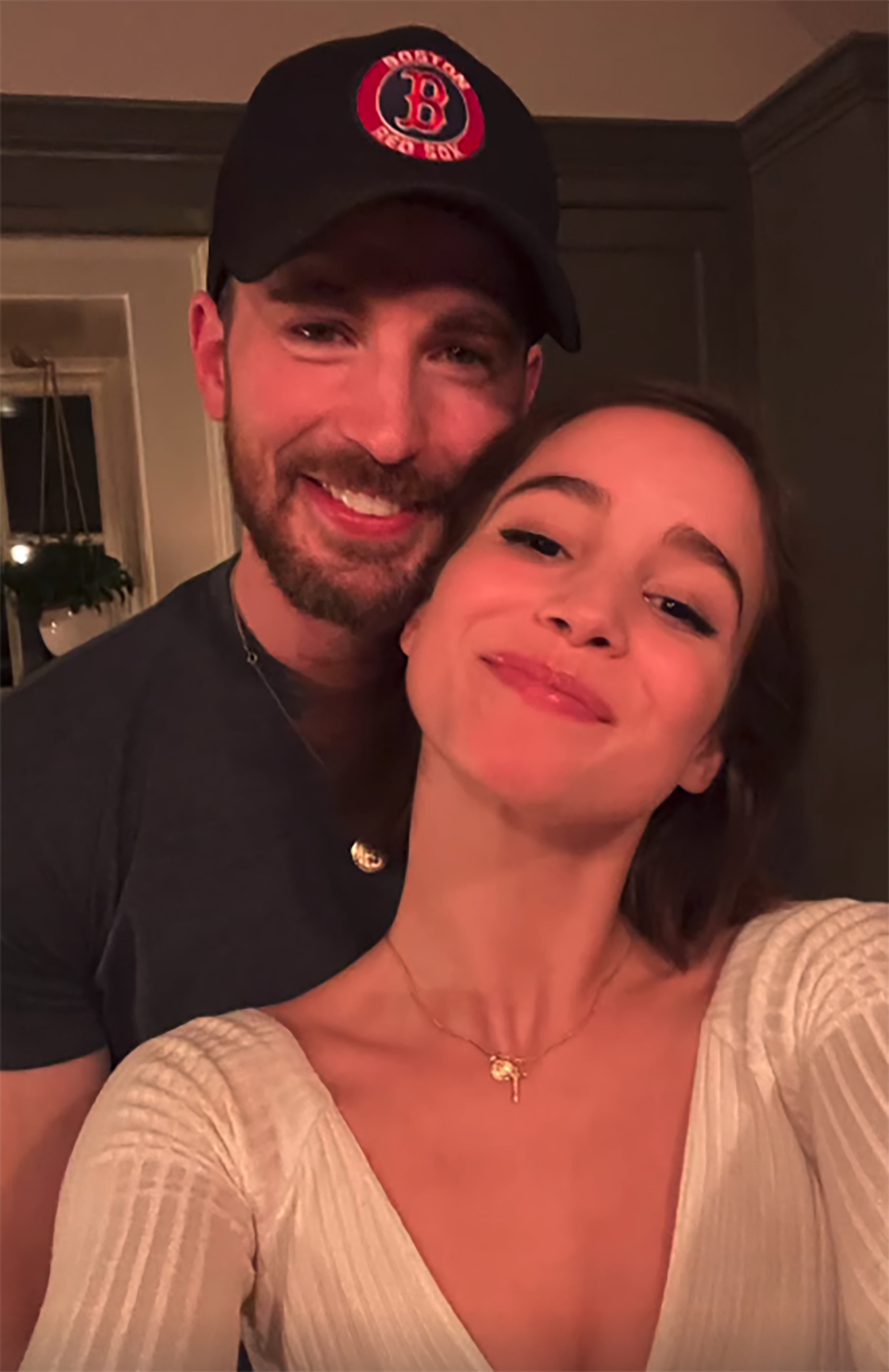Chris Evans and Alba Baptista pose in an instagram photo.
