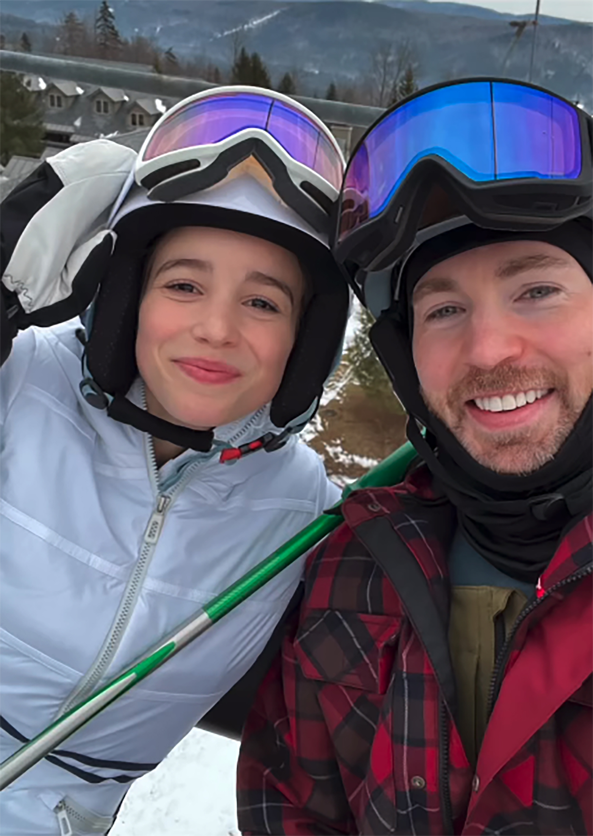 Chris Evans and Alba Baptista pose together.