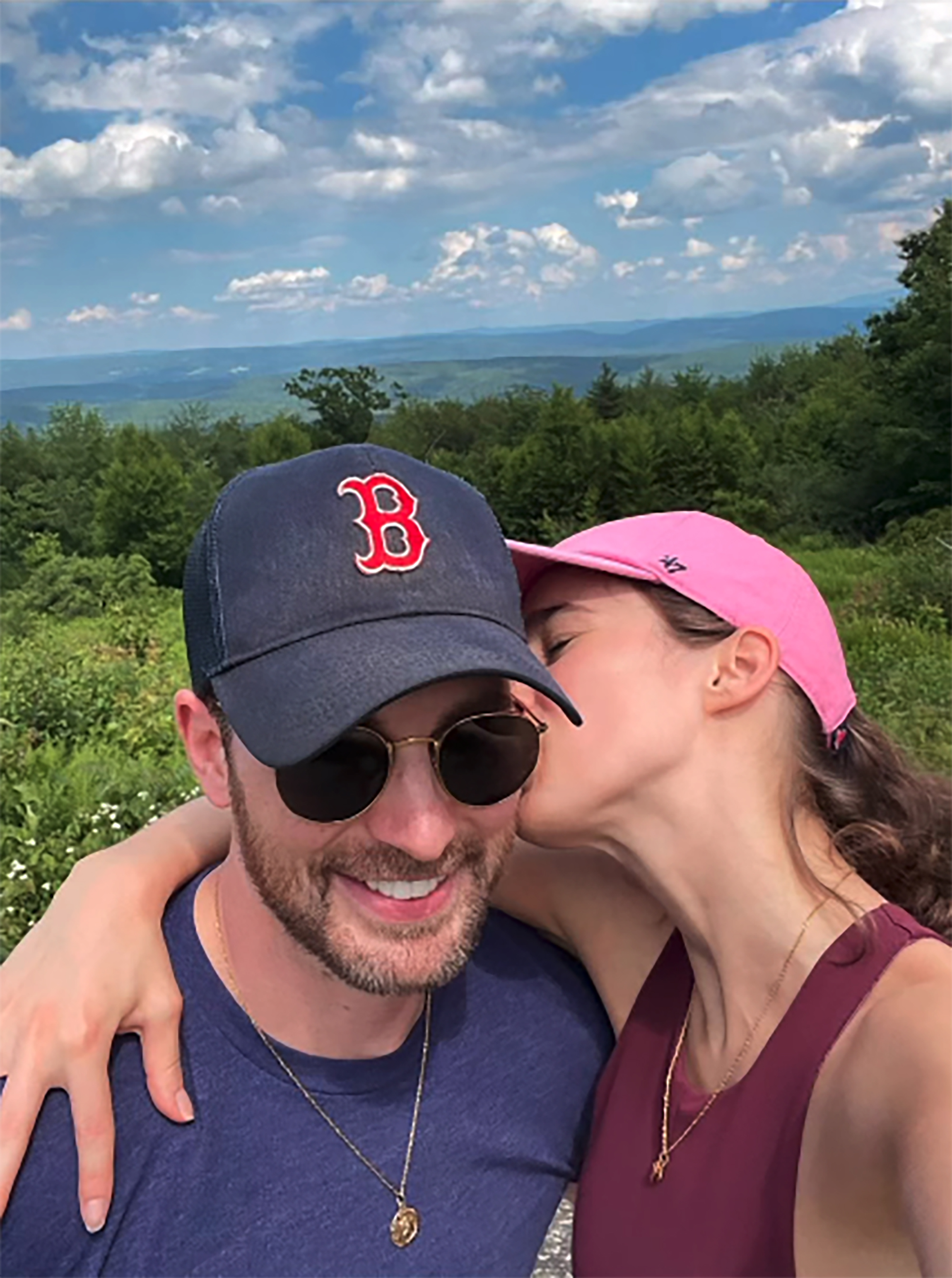 Chris Evans and Alba Baptista pose in a photo.