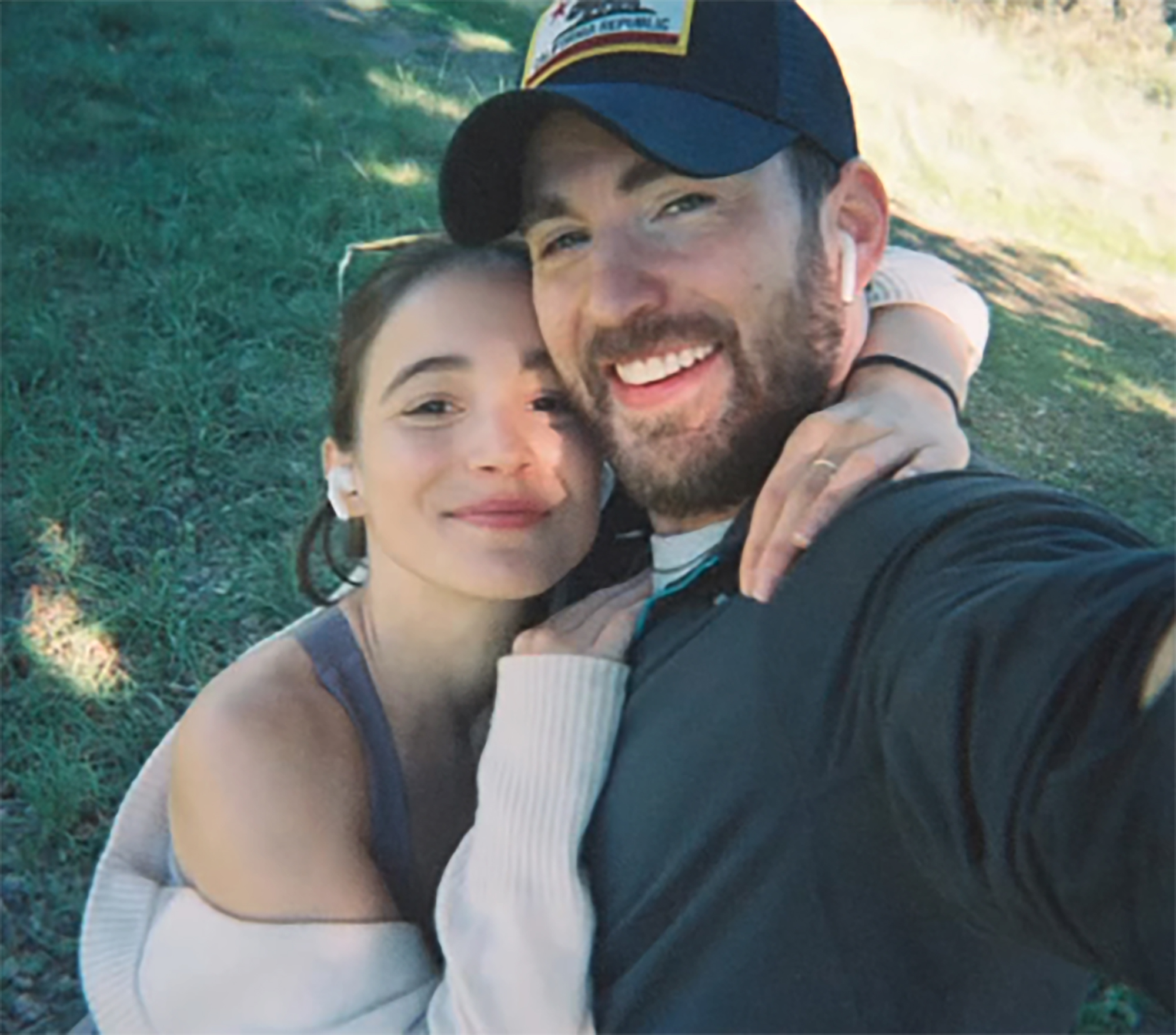 Chris Evans and Alba Baptista pose in a photo.