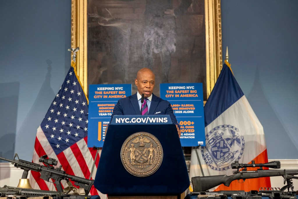 Mayor Eric Adams speaking at a press conference about decreasing crime in NYC.
