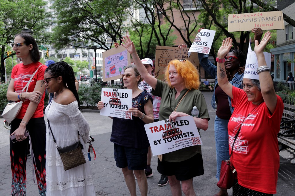 Protestors rally for priority boarding on the Roosevelt Island Tram.