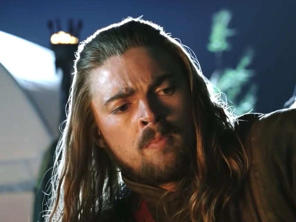Éomer wearing a brown jacket at camp in lord of the rings
