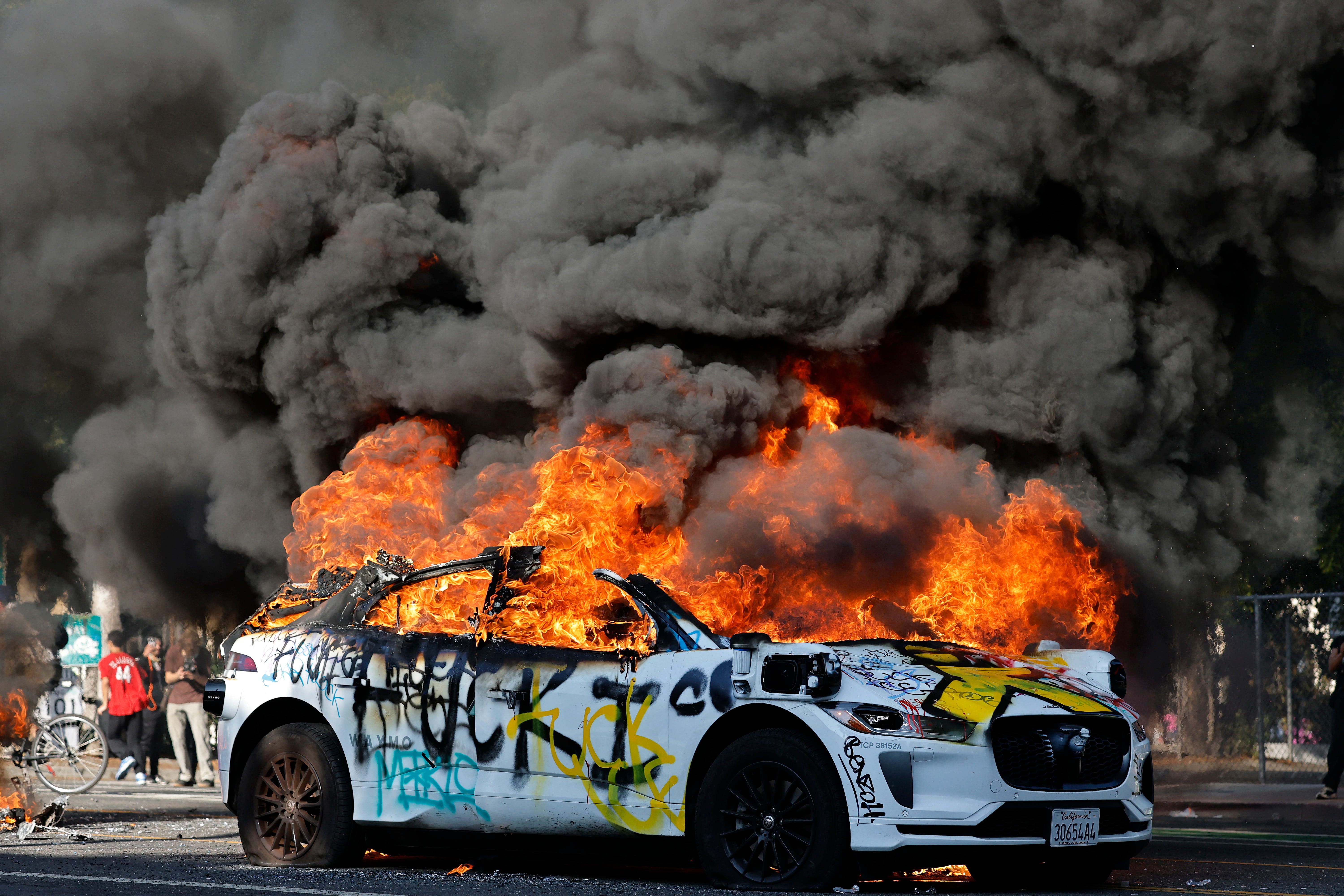 Waymo vehicle on fire in LA anti-ICE protests
