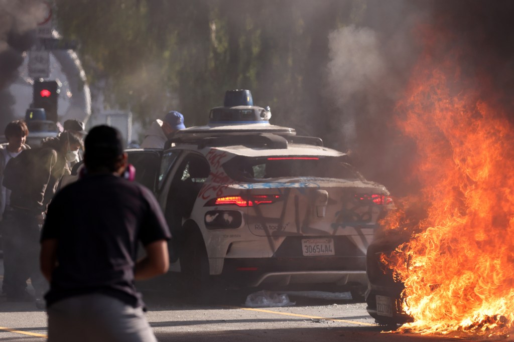 A burning car during a protest in Los Angeles.