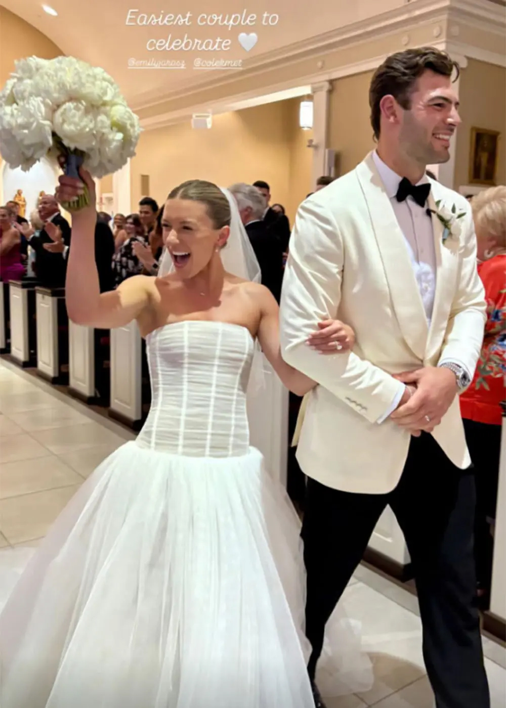 Cole Kmet and Emily Jarosz in wedding gear. 