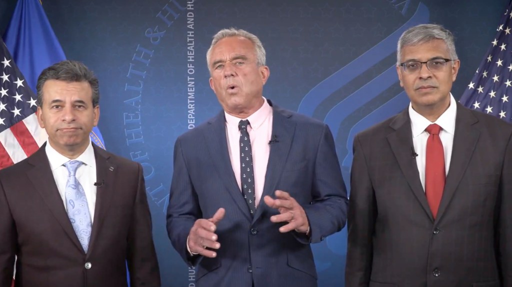 Robert F. Kennedy Jr., Dr. Martin Makary, and Dr. Jay Bhattacharya announcing changes to COVID-19 vaccine policy.