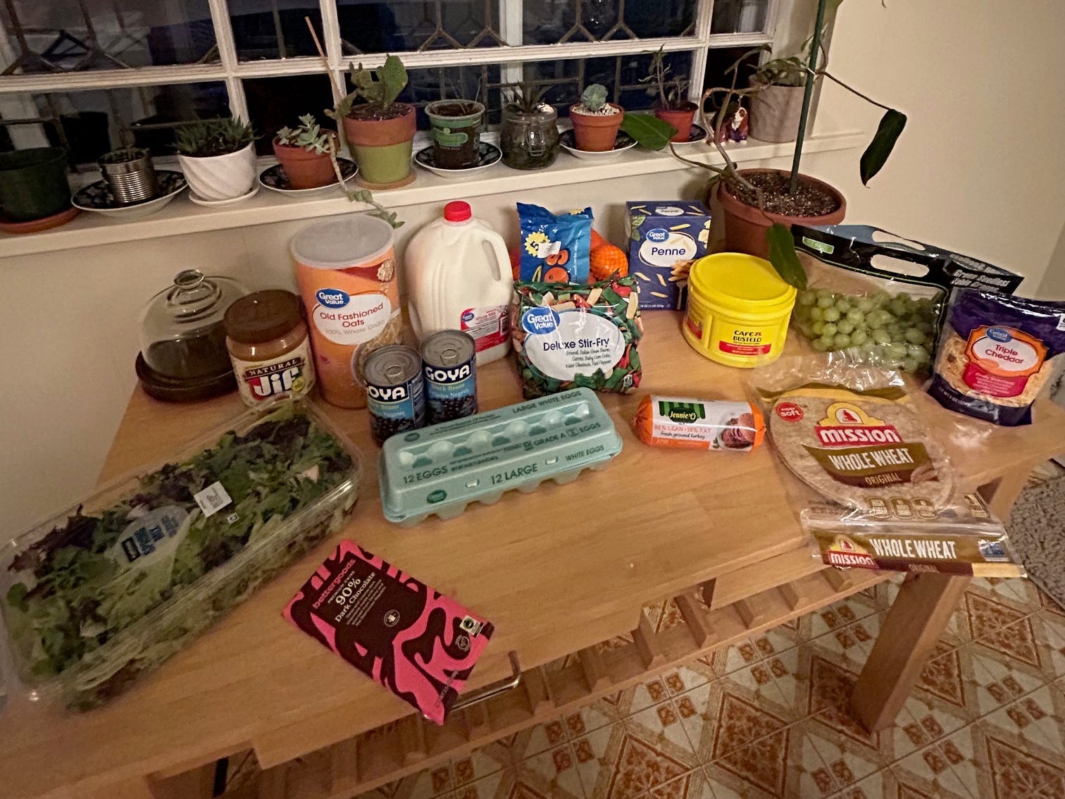 Groceries from Walmart arranged on a table 