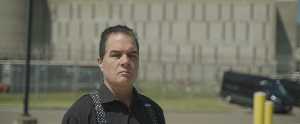 David Jimenez in front of a prison.