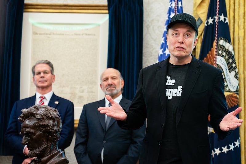 Elon Musk, alongside Secretary of Treasury Scott Bessent and Secretary of Commerce Howard Lutnick.