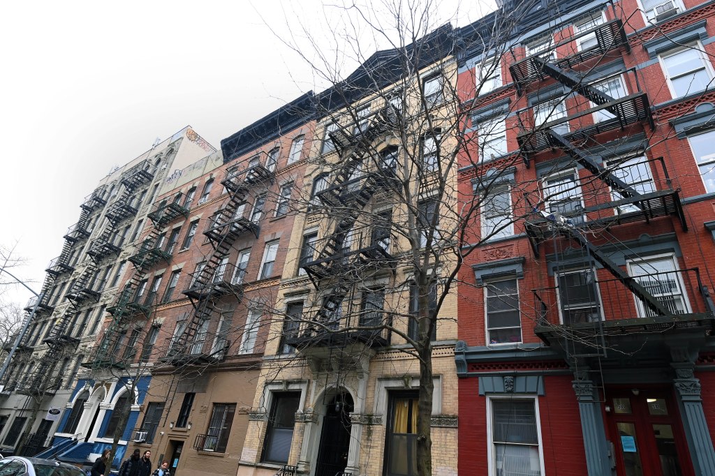 New York City apartment buildings with fire escapes.