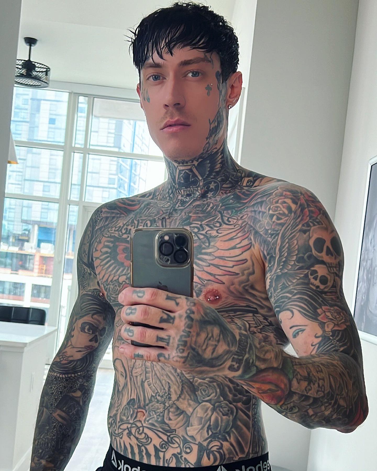 Trace Cyrus shows off his tattoos. 