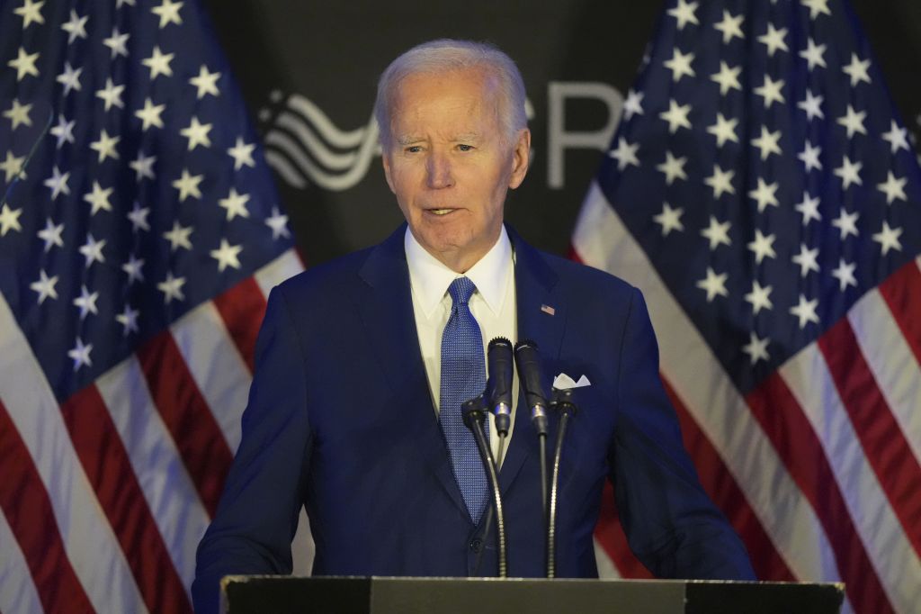 President Biden speaking at a conference in Chicago.