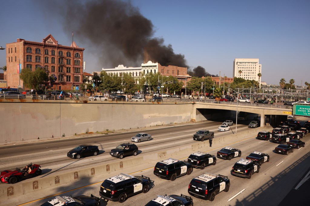 Serious disorder takes place in downtown Los Angeles hundredsof law enforcement are deployed as are National Guard.