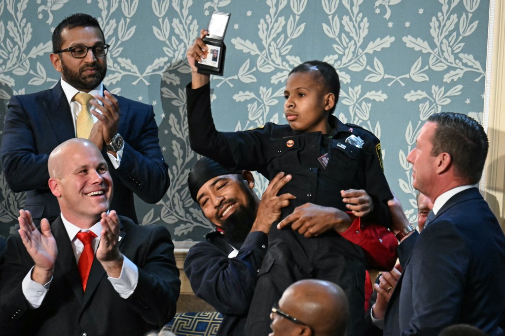 Daniel is held up as he is honored by President Trump during a joint session of Congress on March 4, 2025.