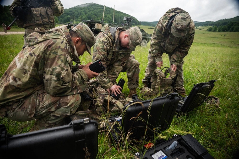 U.S. Army soldiers deploying smart rifle scopes.