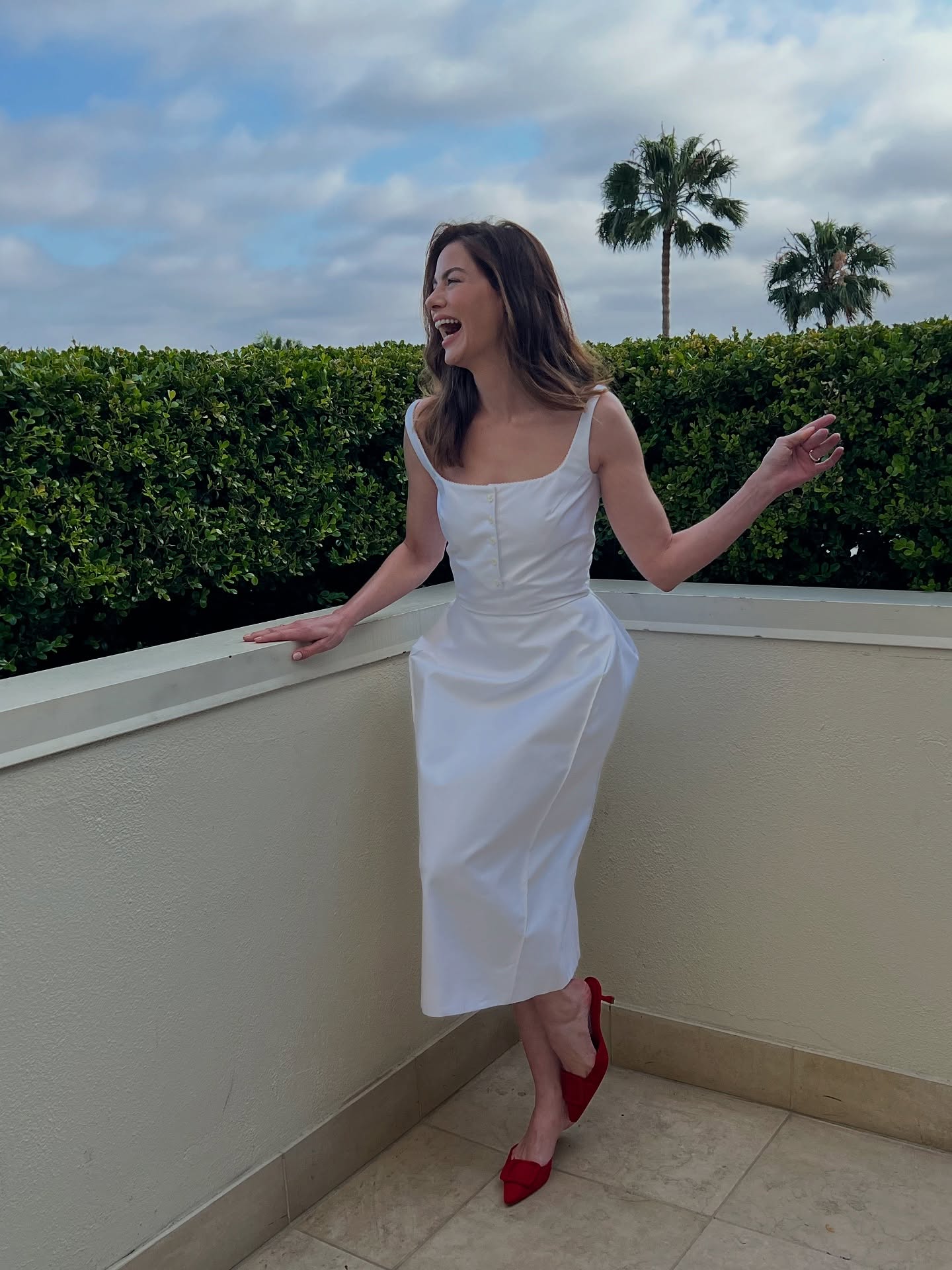 Michelle Monaghan has a laugh while all glammed up.