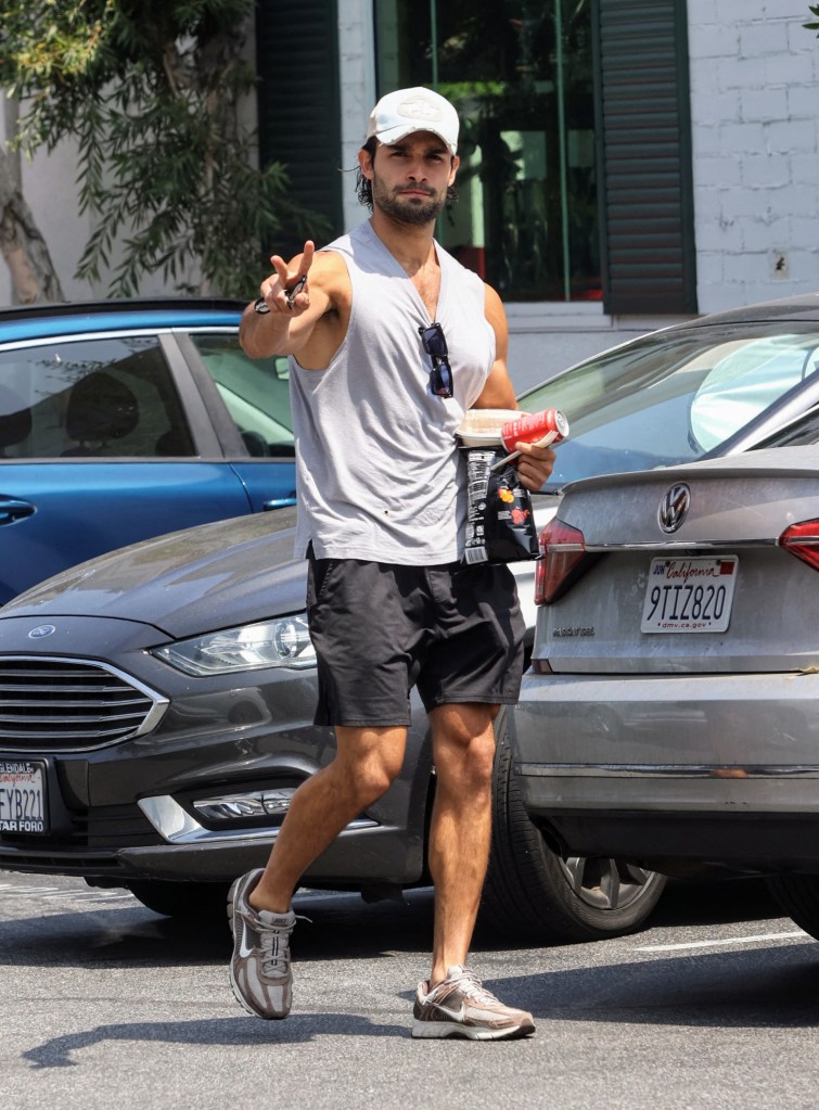 Sam Asghari picks up some food while out in Los Angeles.
