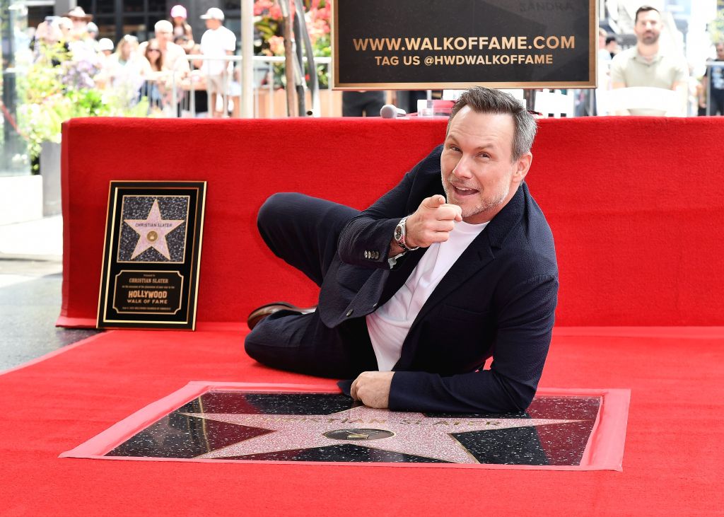 Christian Slater strikes a pose while receiving his star on the Hollywood Walk of Fame. 