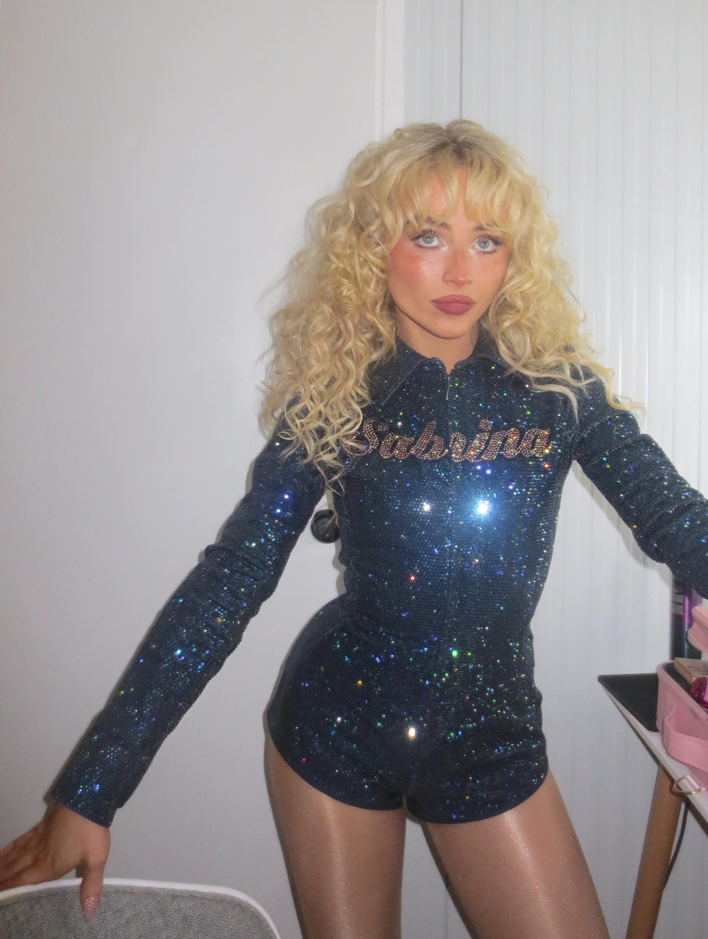 Sabrina Carpenter shows off a sparkly costume while playing a show in Barcelona.