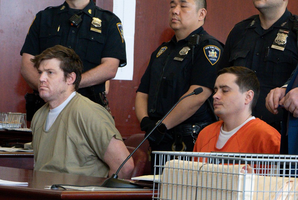 Two men in prison attire at their arraignment in Manhattan Supreme Court.