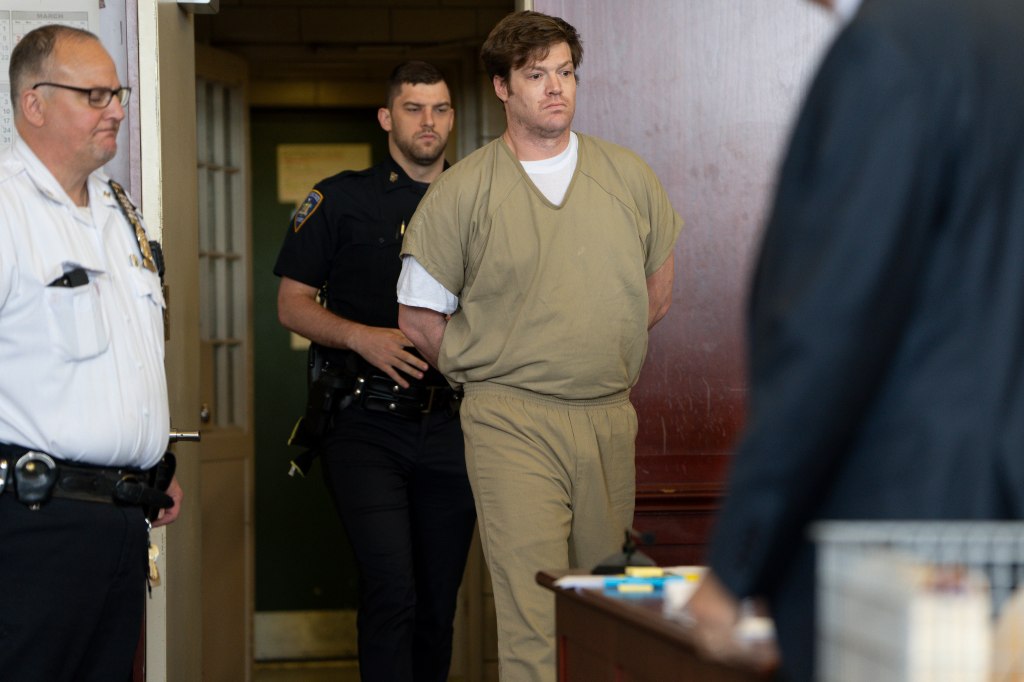 William Duplessie, in khaki prison garb, arraigned in Manhattan Supreme Court.