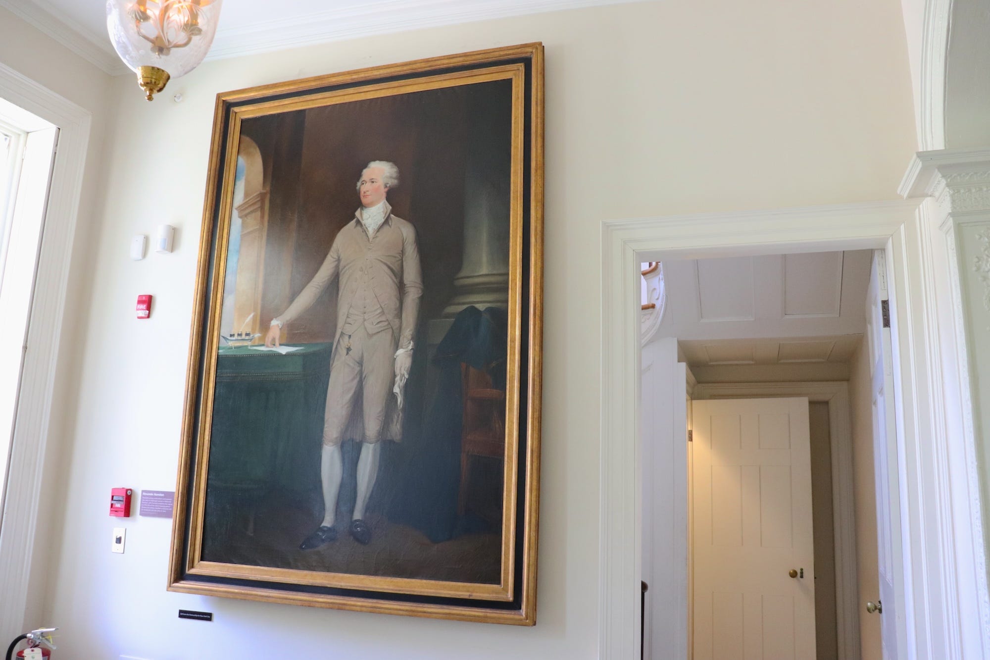A copy of a full-length portrait of Alexander Hamilton.