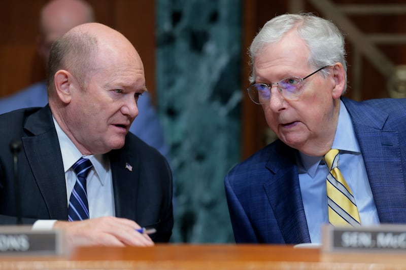 Democratic Sen. Chris Coons (left) and Republican Subcommittee Chairman Sen. Mitch McConnell (right) both raised fierce criticism of the Trump administration's response to Ukraine and questioned whether Vladimir Putin actually wanted a deal.