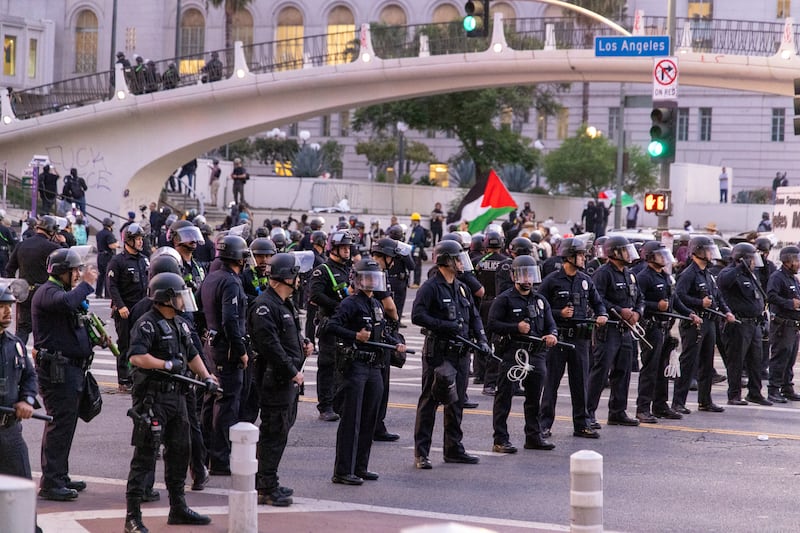 LAPD rally as a curfew takes effect in Los Angeles on June 10, 2025, following days of protests in response to federal immigration operations.