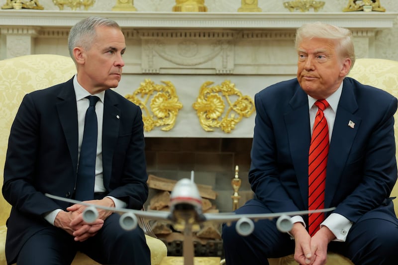 Mark Carney (L) with Donald Trump (R)