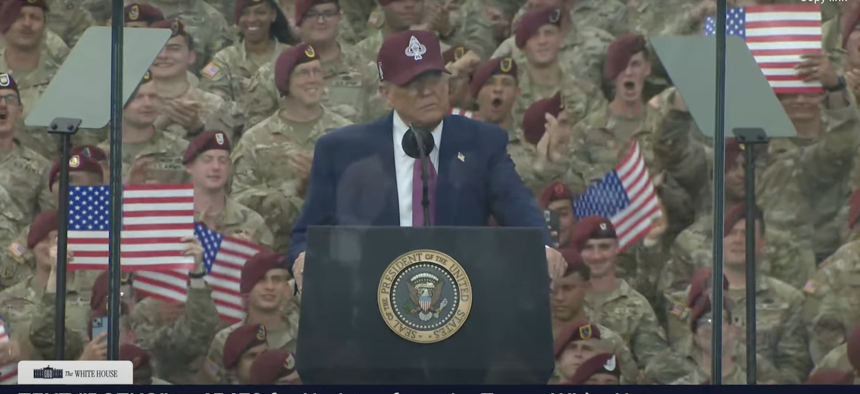 A screenshot from the White House video feed shows President Trump addressing soldiers at Fort Bragg, N.C., on June 10, 2025.