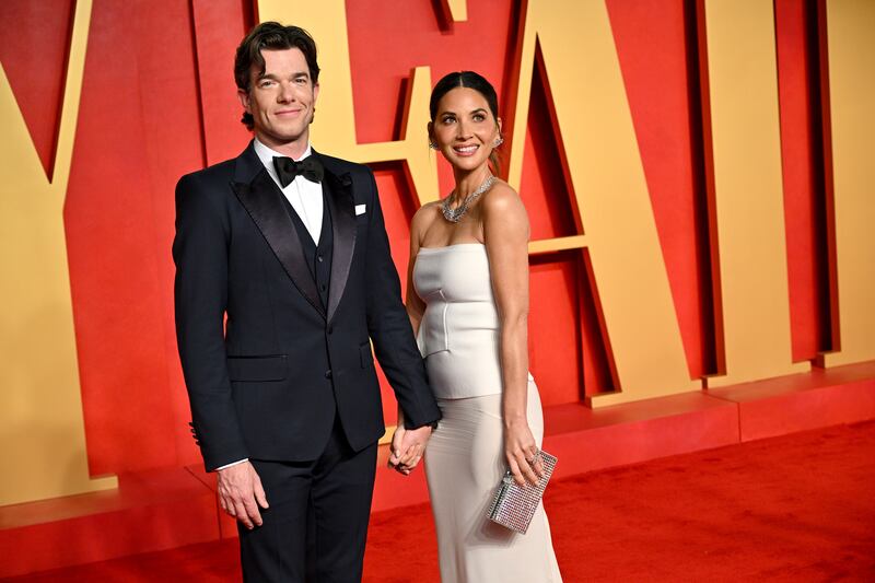 John Mulaney and Olivia Munn attend the 2024 Vanity Fair Oscar Party.