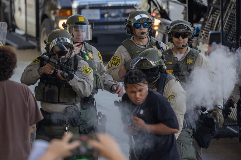 Sheriff deputies open fire with less-than-lethal weapons on protesters at close range as protests continue in an approximately one-square mile area of downtown Los Angeles.