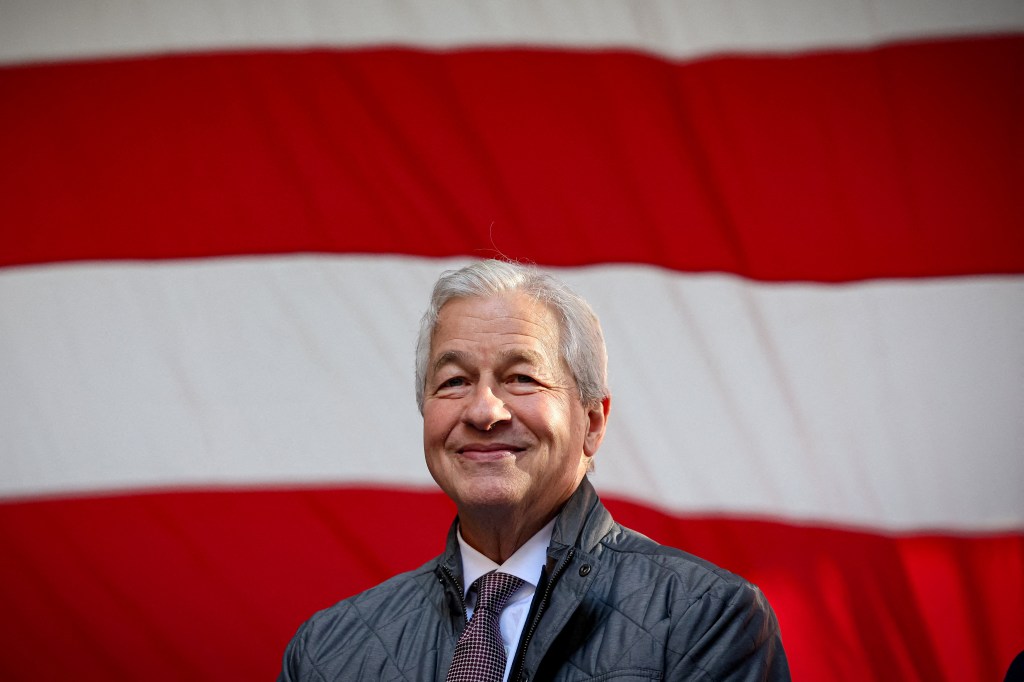 Jamie Dimon in front of an American flag.