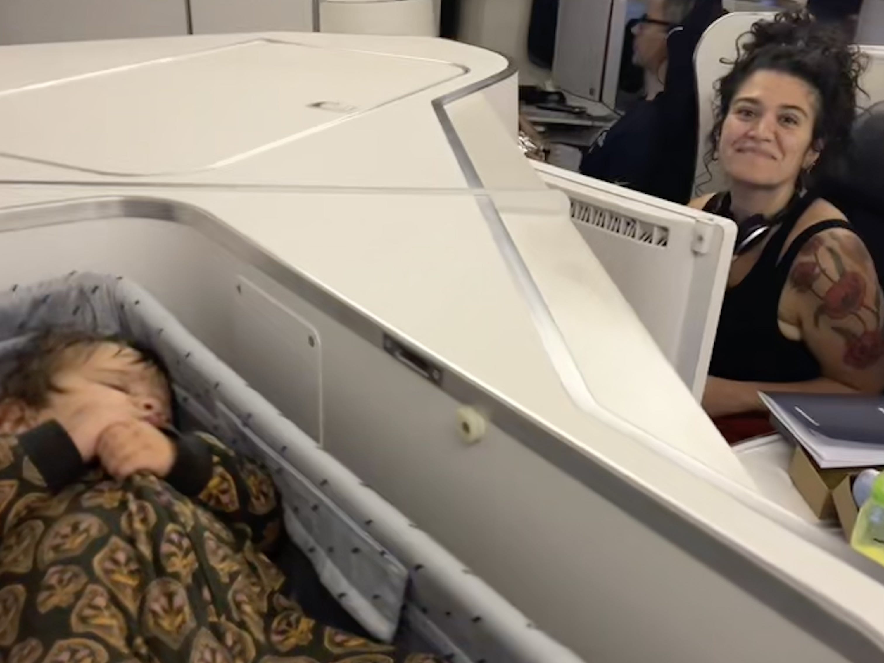 Mary Kay McBrayer in irst class with her infant