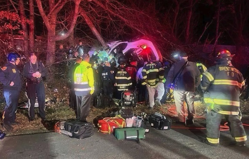 Emergency responders at a car accident scene.