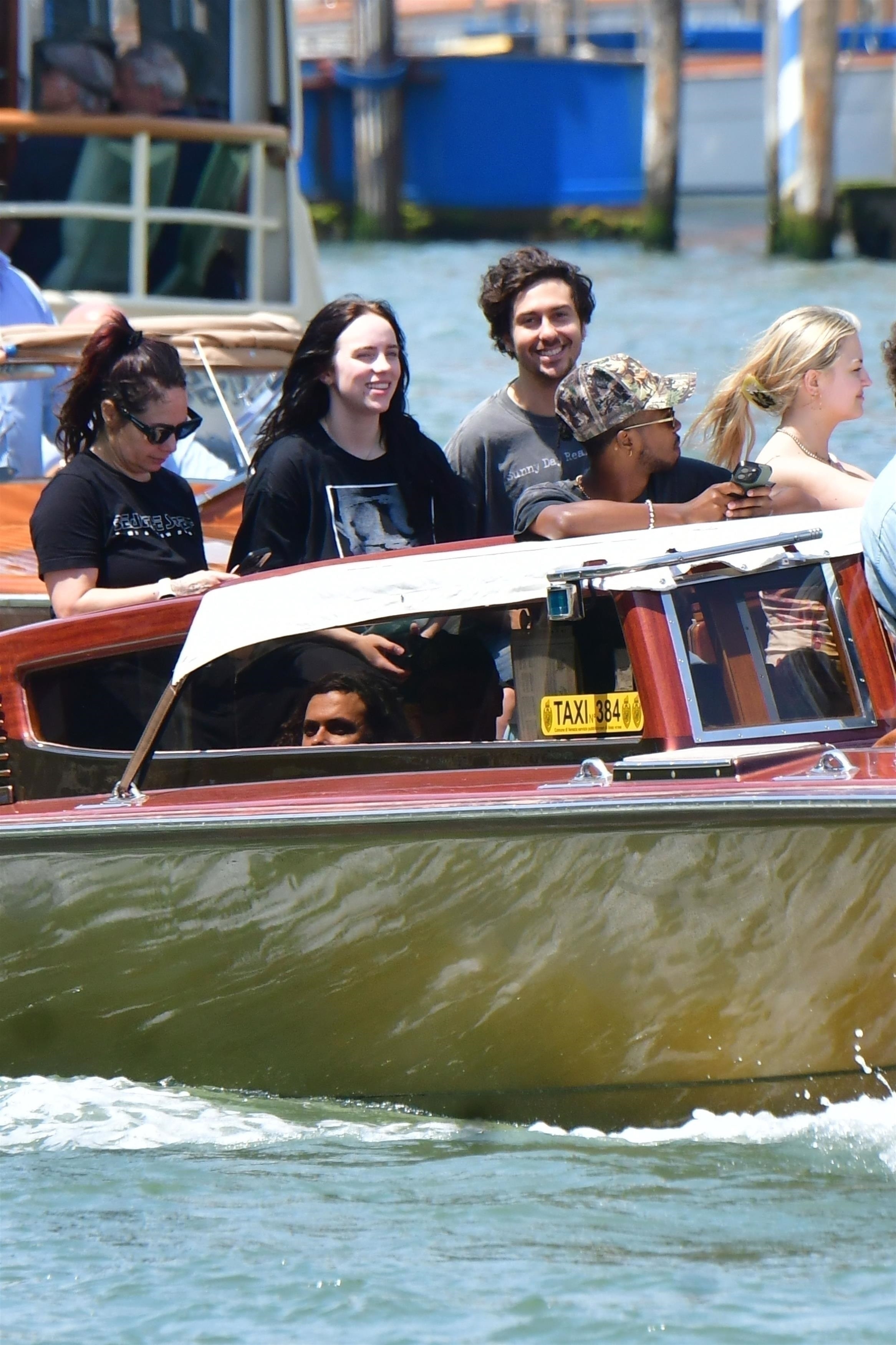 Billie Eilish and Nat Wolff on a water taxi in Venice, Italy, in 2025.