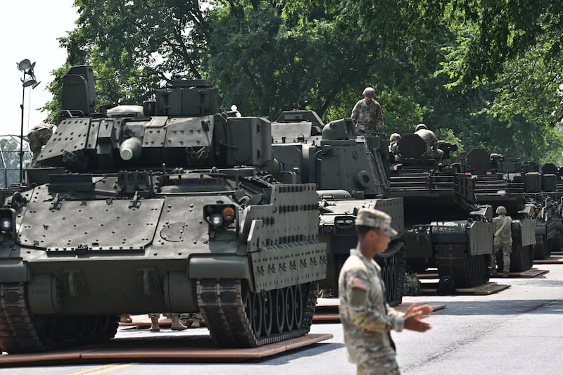 A column of vehicles including a Bradley Fighting Vehicle (L) will be taking part in the Army's 250th birthday celebration parade.