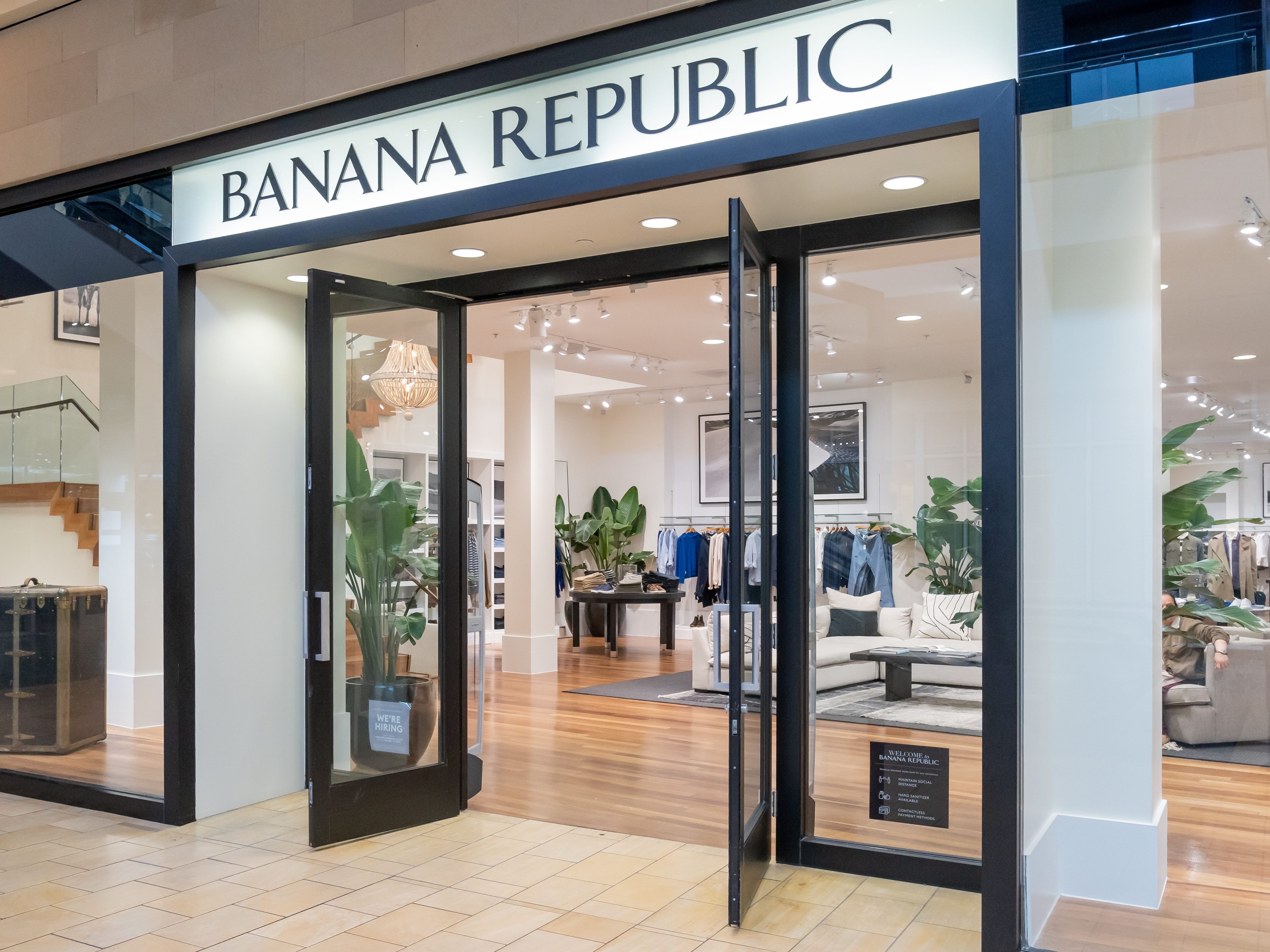 The exterior of a Banana Republic store in a mall.